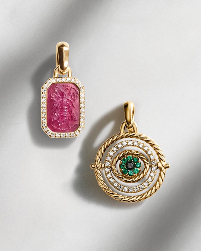 Two David Yurman charms.