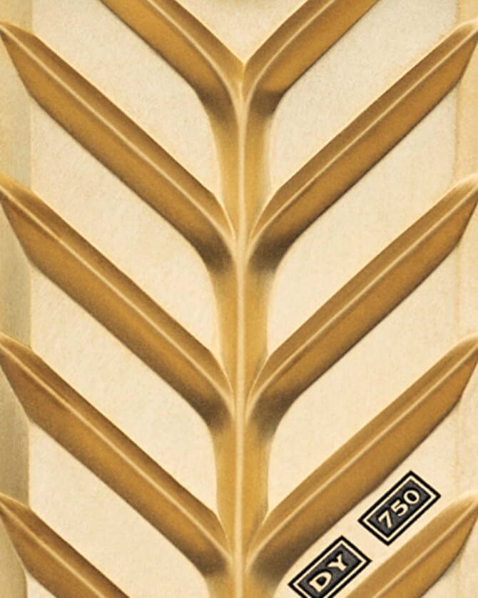 Close up of a David Yurman Chevron tag in gold.