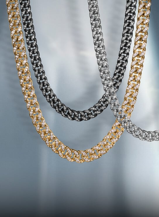 Three David Yurman bracelets for men.